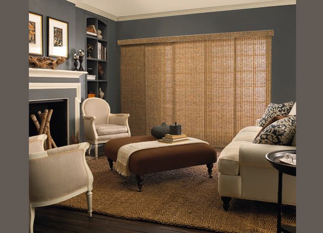 Fort Myers Living room with navy walls and tan sliding panel tracks.